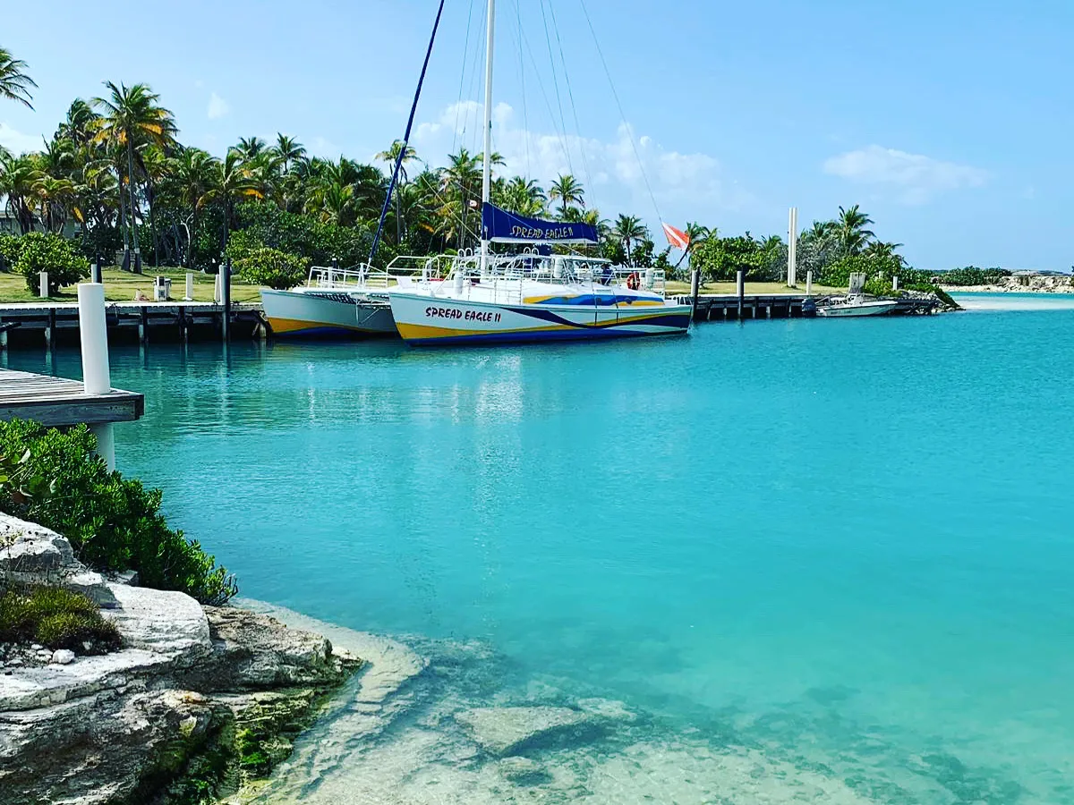 a small boat in a body of water
