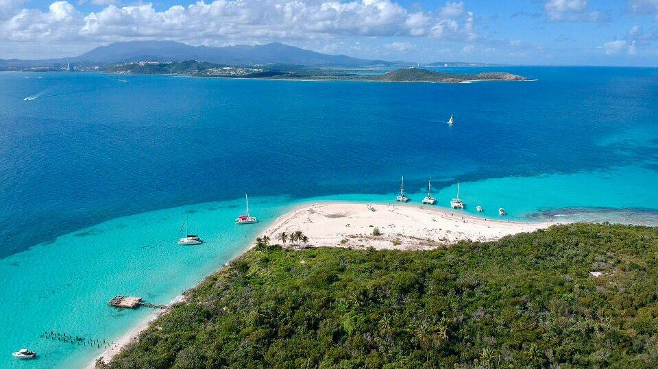 a view of a beach next to a body of water